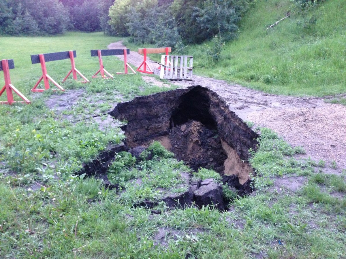 Sinkhole at 94 Ave and 98 A Street.