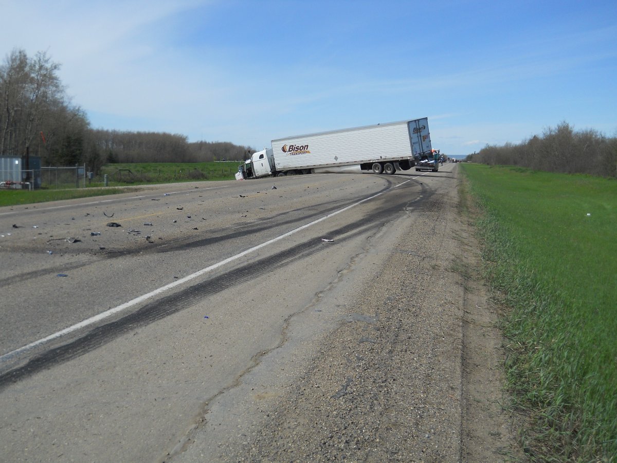A motorcyclist dies in head-one collision with semi truck near Peace River, Thursday, June 6, 2013. 