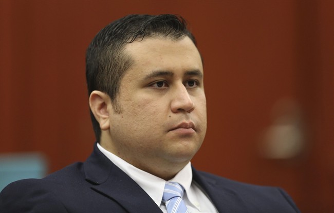 FILE - This June 20, 2013 file photo, George Zimmerman listens as his defense counsel Mark O'Mara questions potential jurors during Zimmerman's trial in Seminole circuit court in Sanford, Fla. 