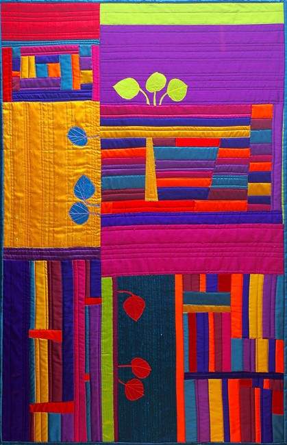 This undated publicity photo shows artist Geri deGruy's quilt "Colorado Autumn Blaze," made with raw silks and cotton/silk blend fabrics. DeGruy, of Castle Rock, Colo., was a therapist before retiring from that career and starting another -- making small art quilts and mixed-media ensembles. 