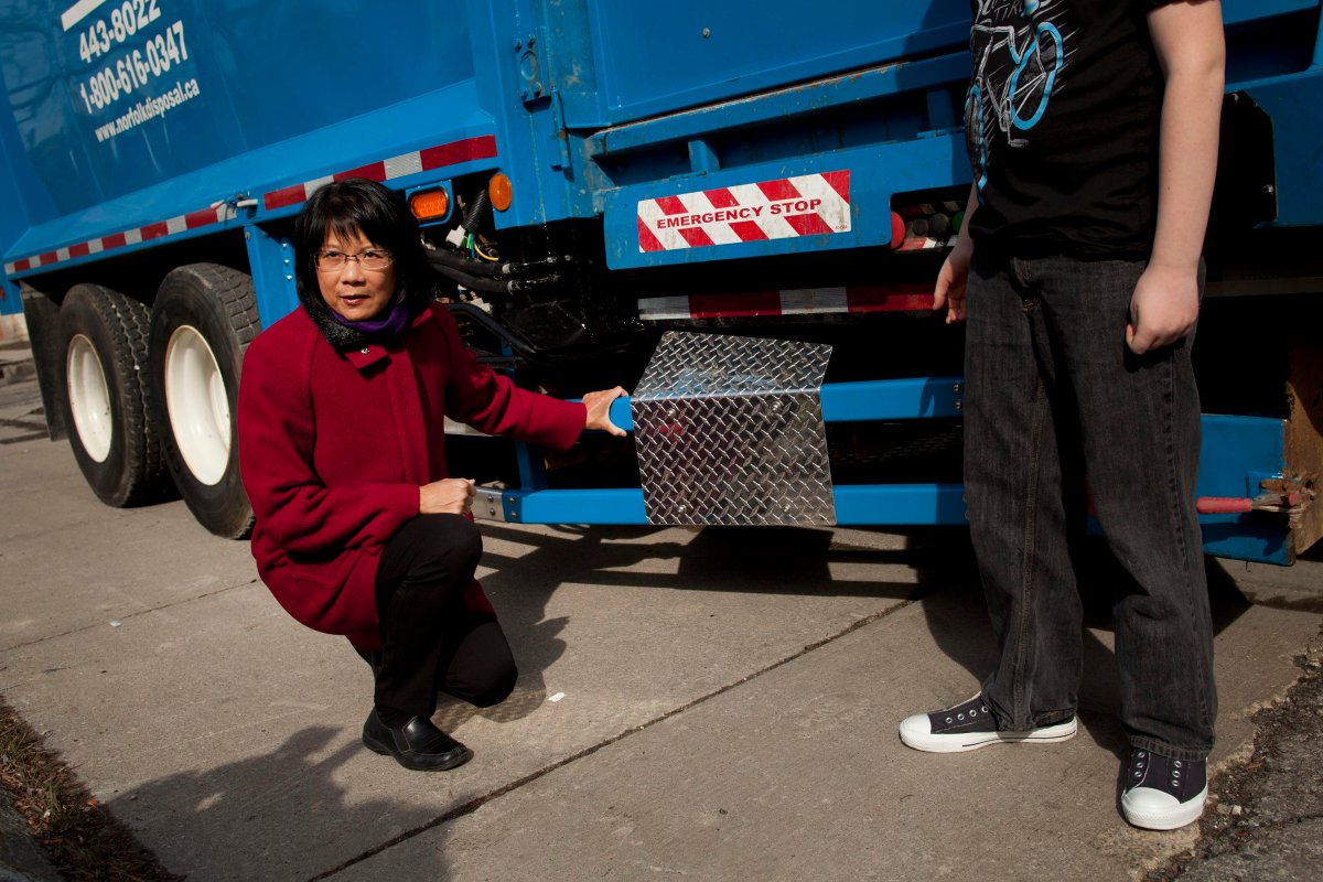 MP Olivia Chow shows a side guard device on a truck at a press conference in Toronto April 9, 2013. The event, led by Chow, was a call for the mandatory use of life-saving side guards on large trucks. (Moe Doiron/The Globe and Mail).