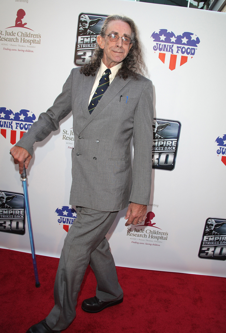 Actor Peter Mayhew arrives with his lightsaber cane to St. Jude's 30th anniversary screening of 'The Empire Strikes Back'  on May 19, 2010 in Los Angeles, California. 