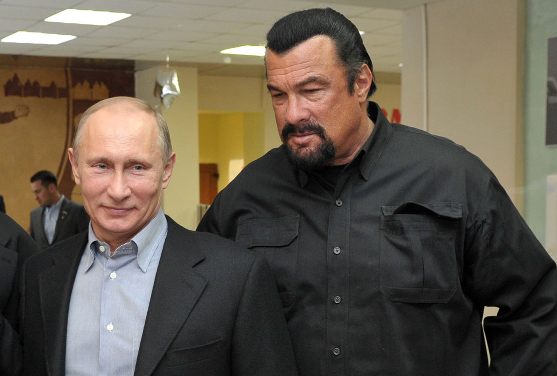 Russia’s President Vladimir Putin and FILE – American action movie actor Steven Seagal visit a newly-built sports complex of Sambo-70 prominent wrestling school in Moscow.