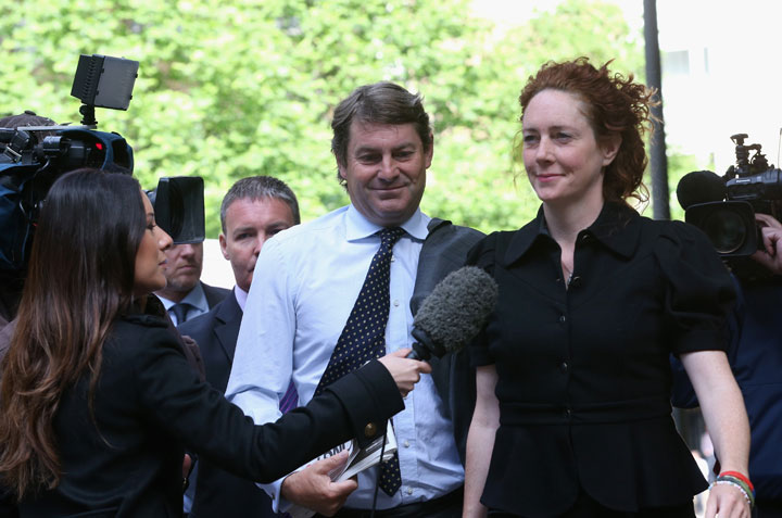 Rebekah Brooks, the former head of News International, and her husband Charles Brooks, arrive at Southwark Crown Court. 