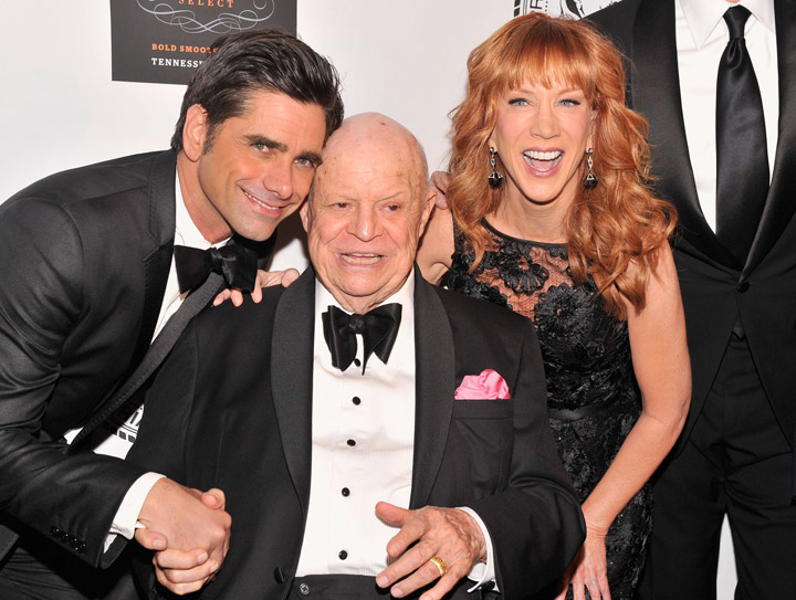 Don Rickles is flanked by John Stamos and Kathy Griffin.