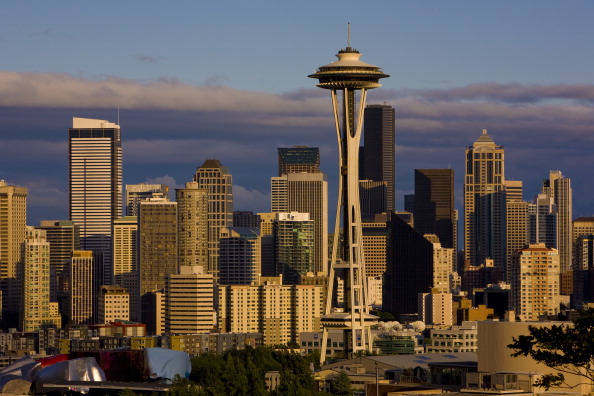 The downtown highrise buildings and Space Needle is illuminated on June 28, 2011 in Seattle, Washington. Seattle, the largest city in Washington State, is located on the edge of Puget Sound.