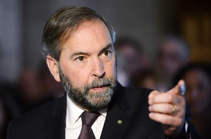 NDP MP Tom Mulcair speaks during an end of Parliament press conference on Parliament Hill in Ottawa on Wednesday, June 19, 2013. 