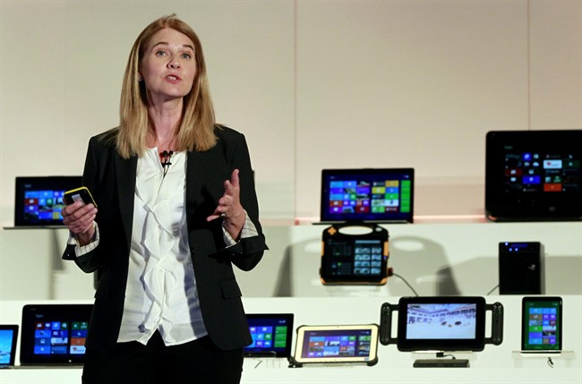 Microsoft Corporation's Chief Financial Officer of its Windows department Tami Reller describes new products during the Computex Taipei 2013, one of the world's largest IT exhibitions, in Taipei, Taiwan, Wednesday, June 5, 2013. During Wednesday's event, Microsoft unveiled its operating system upgrade 8.1. 
