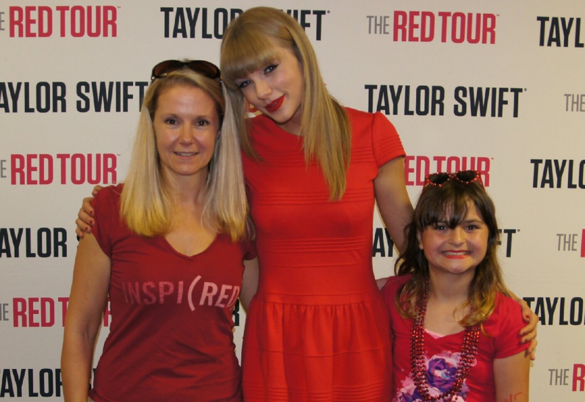 Carianne and Selena Yorke meet Taylor Swift in Vancouver on June 29, 2013. 