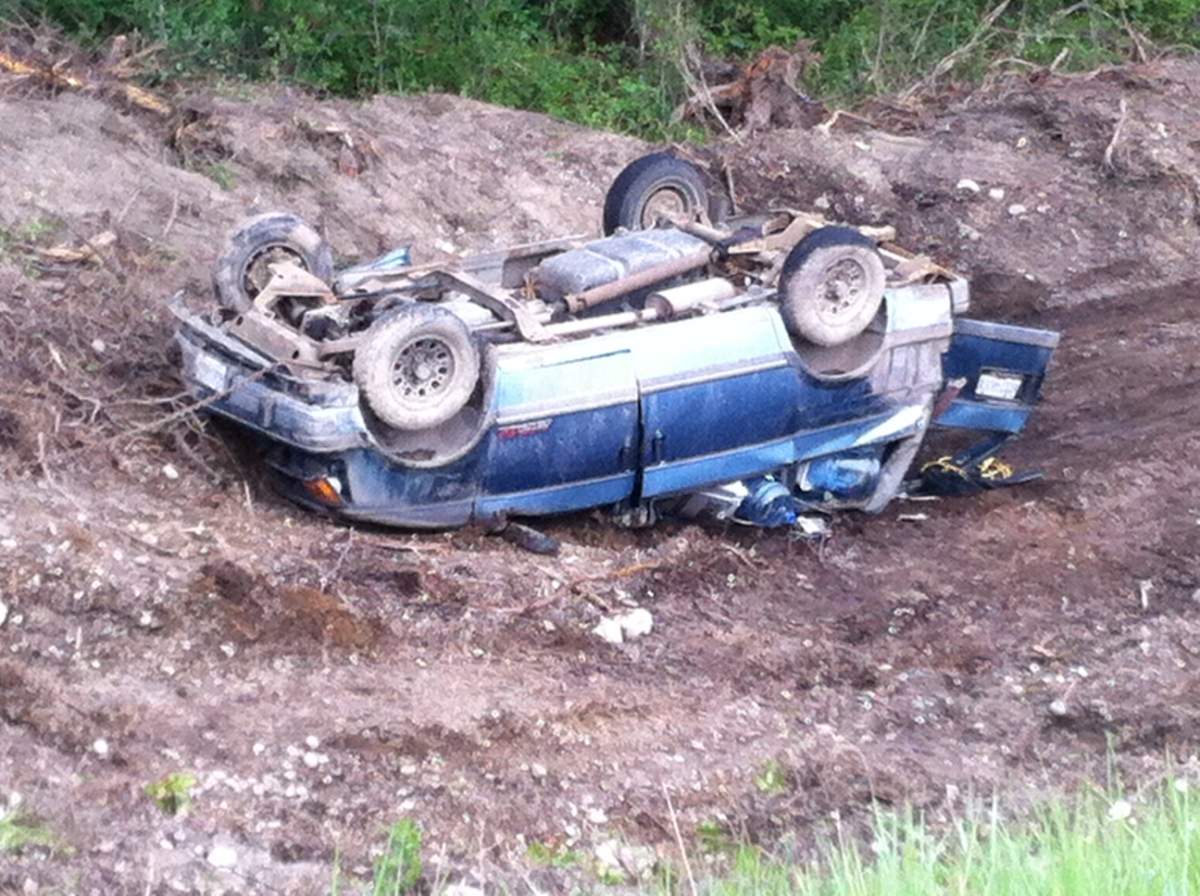 The vehicle was at the bottom of a 10 meter embankment off highway 97-A at Eagle Point road near Armstrong.