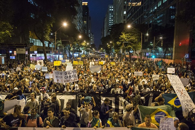 People march toward the Cinelandia square during a protest in Rio de Janeiro, Brazil, Monday, June 24, 2013. 