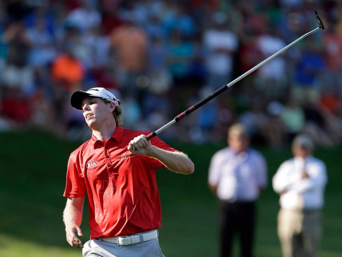 David Hearn reacts after missing a putt during a playoff in the John Deere Classic golf tournament, Sunday, July 14, 2013, at TPC Deere Run in Silvis, Ill. Jordan Spieth defeated Hearn and Zach Johnson on the fifth hole of the playoff.