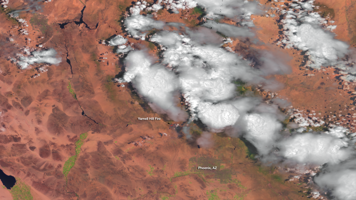 A fire that started in Yarnell Hill, Arizona on June 28 continued to rage 30 miles southwest of Prescott where 19 firefighters lost their lives battling the blaze. (NOAA)