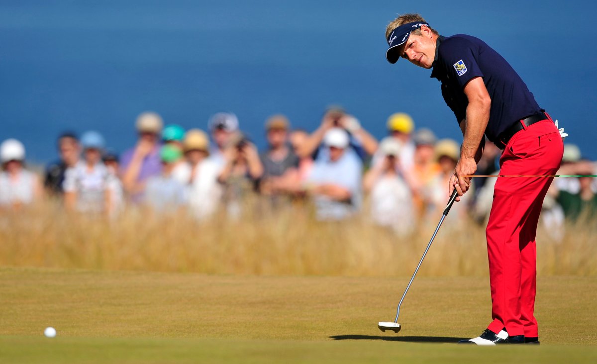 England's Luke Donald putts on the fifth during the second round of the 2013 British Open Golf Championship at Muirfield golf course at Gullane in Scotland on July 19, 2013.