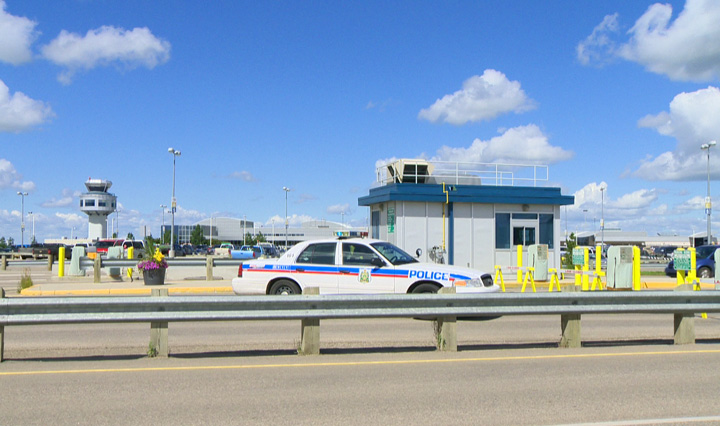 Saskatoon police are investigating a possible suspicious package in the parking lot at the airport.