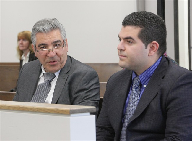 Bob Nazarian (left), owner of the ill-fated Algo Centre Mall, is seen with his son Levon at the inquiry into the tragedy in Elliot Lake, Ont., on Monday, June 15, 2013. 