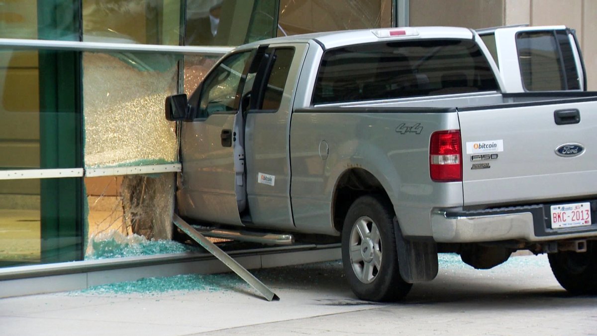 A truck smashed into the front of the Calgary Courts Centre on Monday, July 29th, 2013. 