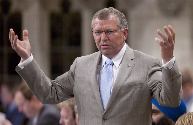 Conservative MP Ted Menzies responds during Question Period in Ottawa, on June 12, 2012. 