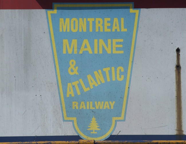 A logo for Montreal Maine and Atlantic railway is shown on a MMA locomotive engine outside their offices in the town of Farnham, Que.