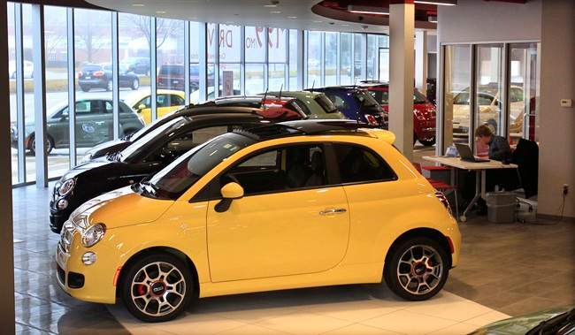 In a Feb. 29, 2012 photo, Fiat 500 vehicles are displayed at the Golling Fiat dealership in Birmingham, Mich. 