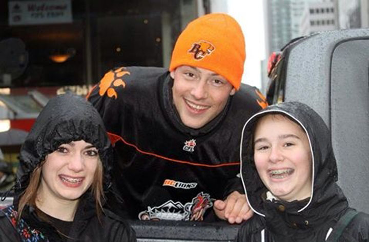 Ashley (left) shared this picture of her and Cory Monteith at the Grey Cup parade on Facebook. She said he was very nice and stopped the parade to take the picture.
