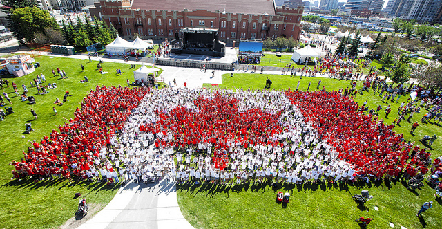 Organizers hosted a ‘living flag’ in Calgary on Canada Day 2013.