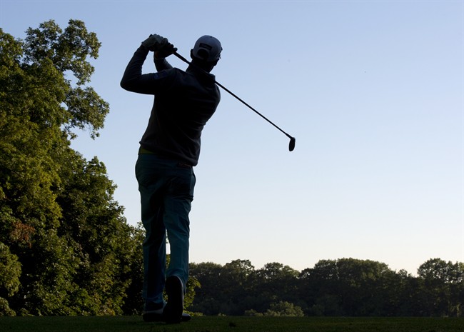 File photo: Graham DeLaet of Weyburn, Sask., tees off on the 11th hole during the first round at the Canadian Open Golf Championship at Glen Abbey in Oakville, Ont., on Thursday, July 25, 2013.