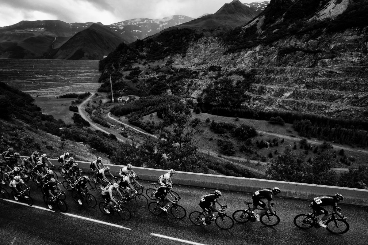 Overall leader's yellow jersey Britain's Christopher Froome rides in the pack during the 204.5 km nineteenth stage of the 100th edition of the Tour de France cycling race on July 19, 2013 between Bourg-d'Oisans and Le Grand-Bornand, French Alps. 