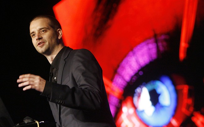 In this July 28, 2010 file photo, Barnaby Jack demonstrates an attack on two automated teller machines during the Black Hat technology conference in Las Vegas. 