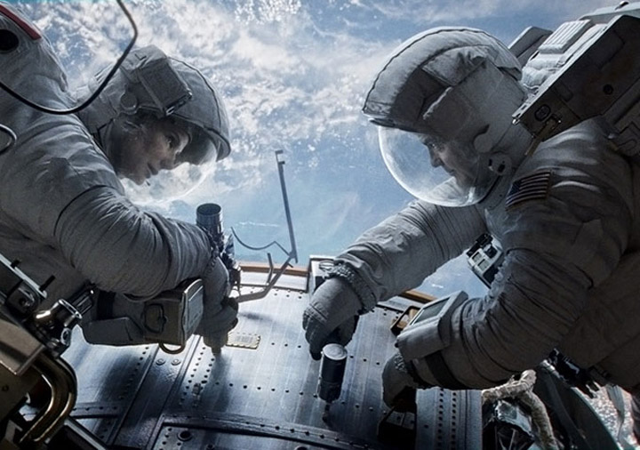 Sandra Bullock and George Clooney star in 'Gravity.'.