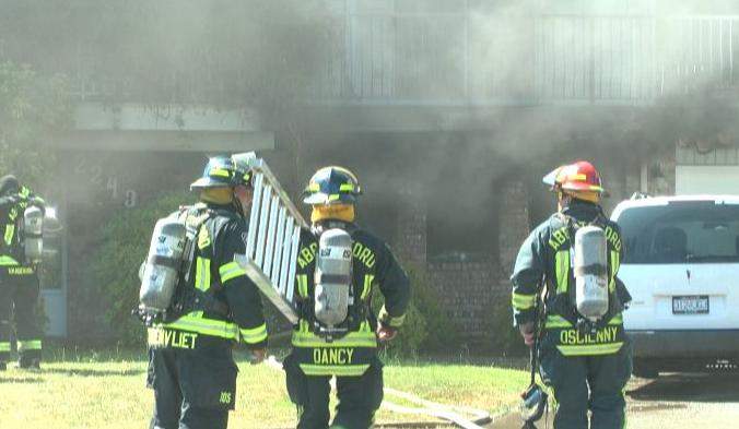 Heavy smoke and water damage after fire at a group home in Abbotsford - image
