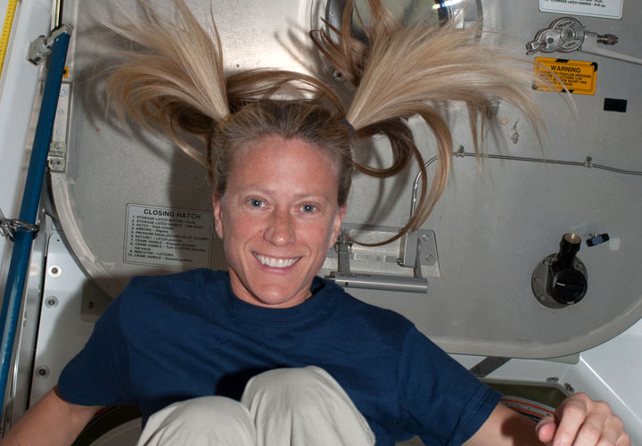 It's recess time for a floating astronaut Karen Nyberg, Expedition 36 flight engineer, in the Unity node aboard the International Space Station.