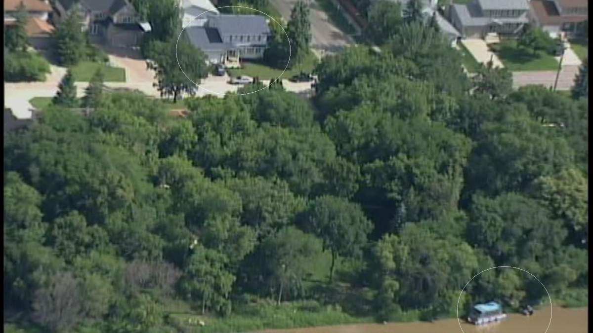 Aerial view showing Gibson home (top) and dive team boat (bottom) on Friday