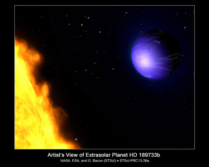 An artist's concept of planet HD 189733 orbiting its sun.
