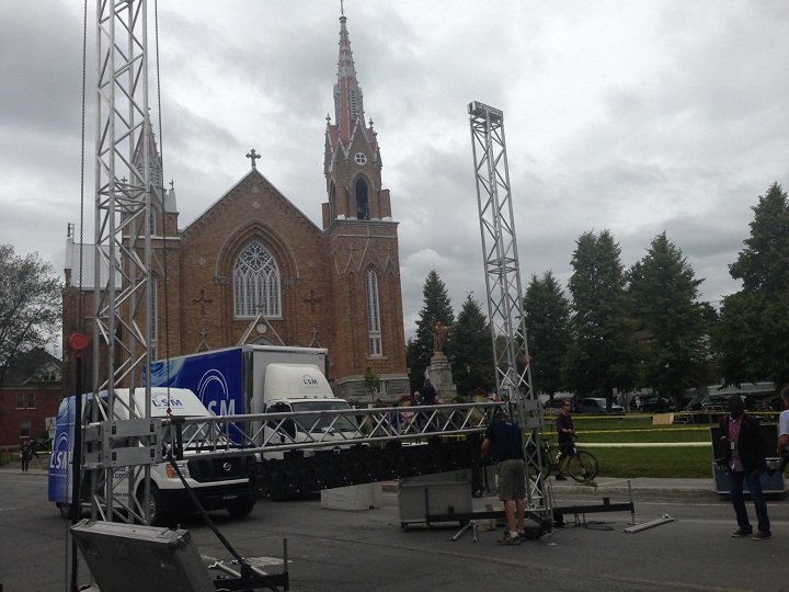 Crews set up for Saturday's memorial service in Lac-Megantic on Friday, July 26, 2013.