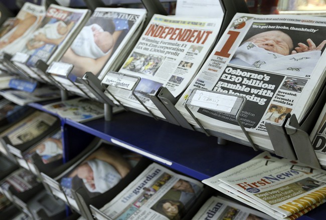British newspapers are displayed for sale in London, Wednesday, July 24, 2013. The newspapers show coverage of the new royal baby boy, third in line to the throne.