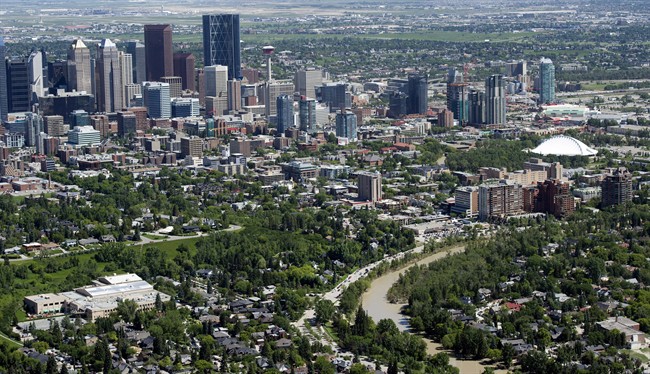 Downtown city core with the Elbow River, foreground, one week after major flooding in Calgary, Alberta on June 27, 2013.