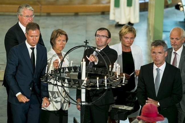Left to right, AUF leader Eskil Pedersen, Minister of Defence Grete Farmo, Foreign Minister Espen Barth Eide, Minister of Government Affairs Rigmor Aasrud and Prime Minister Jens Stoltenberg light candles during the memorial service at Oslo Cathedral, two years after the terrorist attacks on 22 July 2011 in Oslo and on Utoya, Monday, July 22, 2013. 