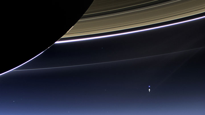 Earth, shown here above the arrow, was photographed by the Cassini spacecraft which is orbiting Saturn, for 15 minutes on Friday, July 19. A full mosaic of the image will be released from NASA some time in the future.
