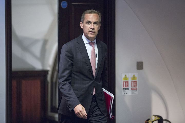 Mark Carney, governor of the Bank of England, arrives at a monetary policy committee (MPC) briefing on his first day inside the central bank's headquarters in London on July 1, 2012.  