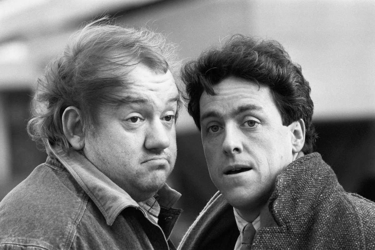 FILE - May 1987 photo of British comedians Mel Smith (left) and Griff Rhys Jones. Smith has died from a heart attack at his home in north west London, his agent Michael Foster has said Saturday July 20, 2013.