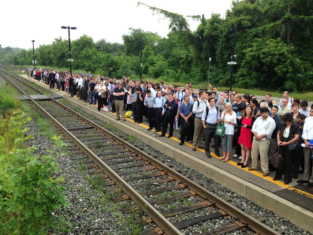 Hundreds waiting for a GO Train at Long Branch Mississauga station on July 9, 2013.