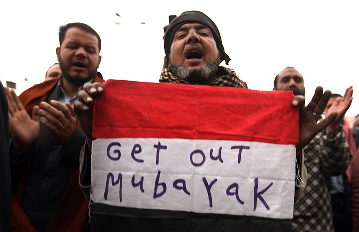 Egyptian anti-government demonstrators shout slogans at Cairo’s Tahrir square on February 4, 2011.