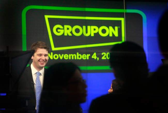 Andrew Mason, founder and CEO of Groupon, attends his company's IPO at Nasdaq, in New York. Former Groupon CEO Mason has been working hard on a new album, "Hardly Workin,'" since he was ousted from the troubled online deals company in February 2013. 