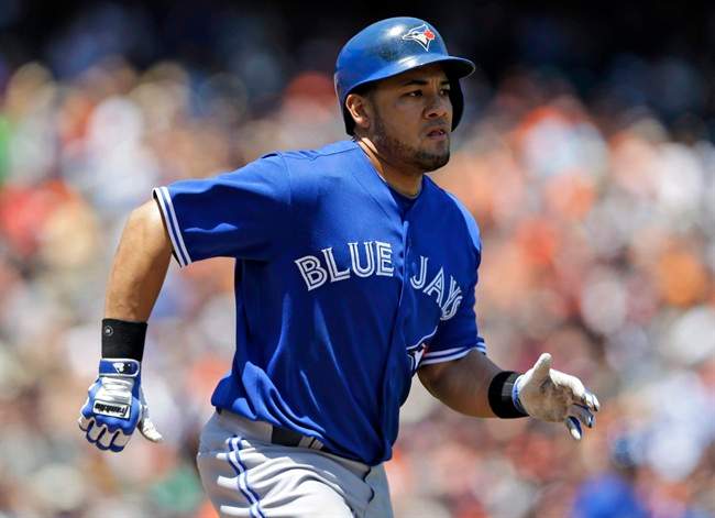 FILE - In this June 5, 2013 file photo, Toronto Blue Jays' Melky Cabrera runs to first base as he grounds out during the fifth inning of a baseball game against the San Francisco Giants in San Francisco. Major League Baseball has told the union which players it intends to suspend in its drug investigation and which ones will receive lengthier penalties for their roles in the Biogenesis case. 
