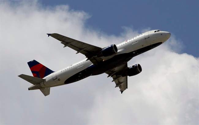 File - This Monday, Aug. 20, 2012, photo, shows a Delta Airlines aircraft taking off at Miami International Airport in Miami.