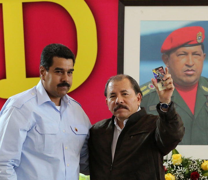 Nicaraguan President Daniel Ortega (R) is seen alongside his Venezuelan counterpart Nicolas Maduro during a Petrocaribe summit in Managua on June 29, 2013.