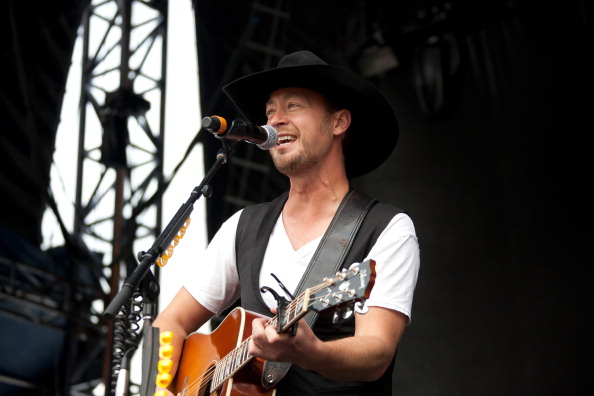 OWMANVILLE, ON - AUGUST 12:  Paul Brandt performs at Boots and Hearts Festival on August 12, 2012 in Bowmanville, Canada.  (Photo by Scott Legato/Getty Images).
