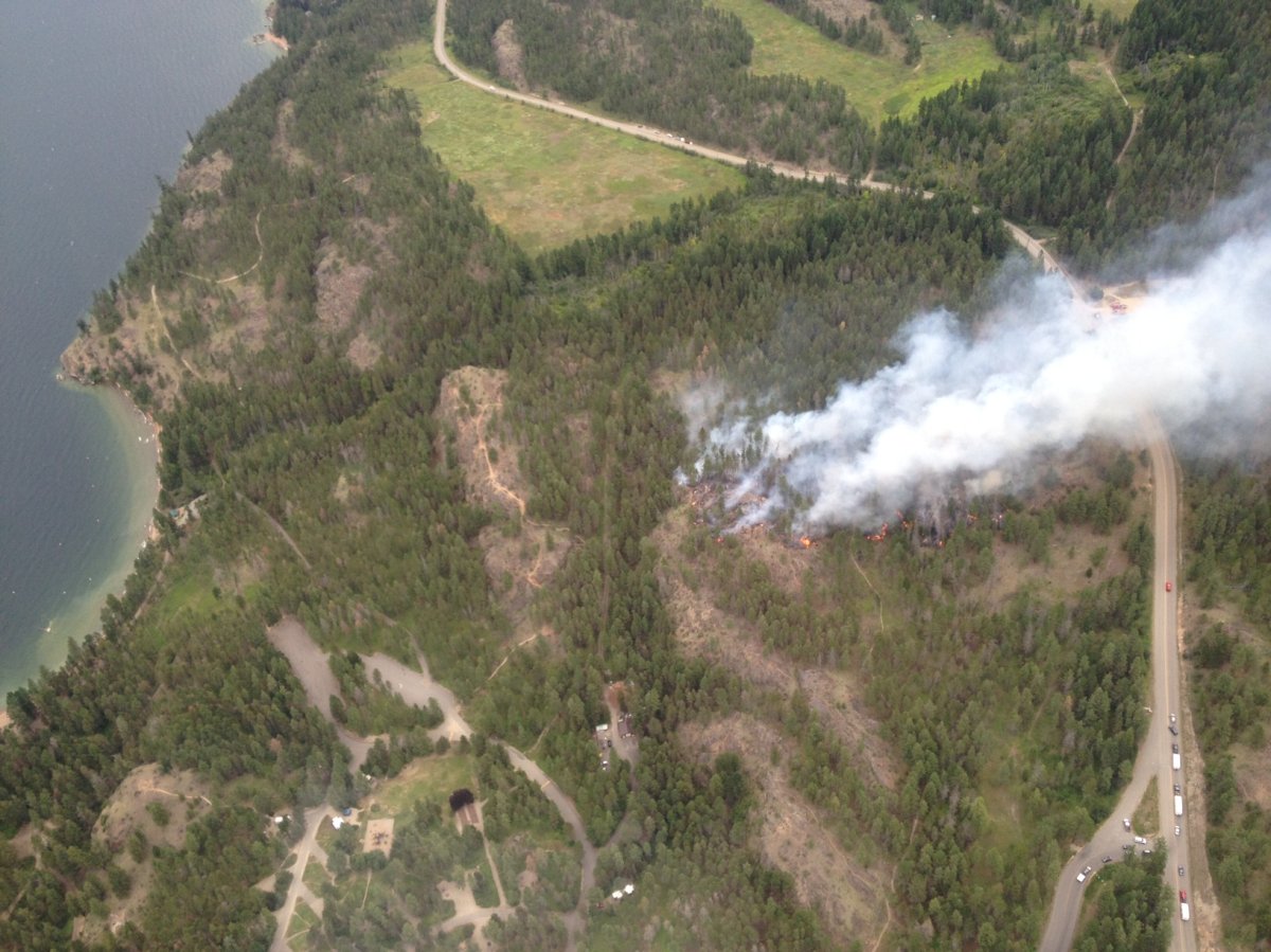 Overhead shot of the fire at Ellison Provincial Park, forcing the evacuation of the campground (seen in the bottom left of the picture). Photo courtesy of BC Wildlife Branch. 