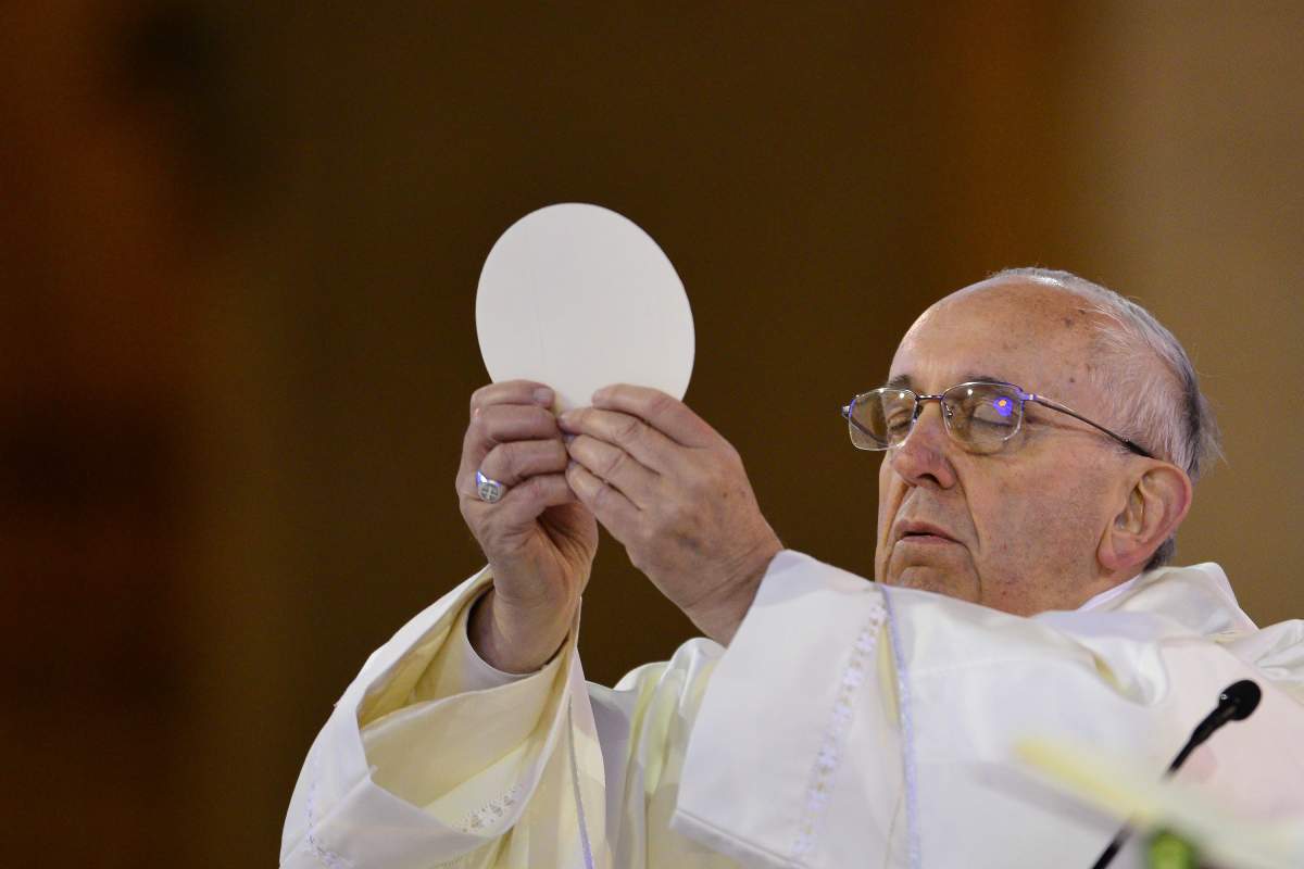 APARECIDA, BRAZIL - JULY 24: Pope Francis holds communion as he celebrates Mass at the Basilica of the National Shrine of Our Lady Aparecida on July 24, 2013 in Aparecida, Brazil.